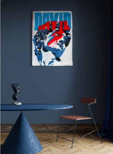 Heroes Abstract artwork featuring a hand and figure against a dark blue wall, with a minimalistic table and chair.